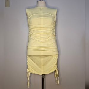 NWT Pastel yellow fully ruched side body con dress